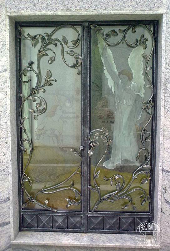 Wrought iron door with gold decoration