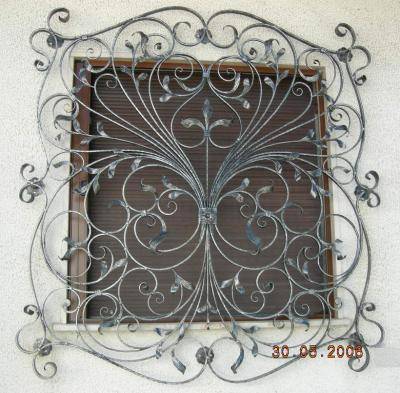 decorated wrought iron grate