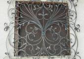 decorated wrought iron grate