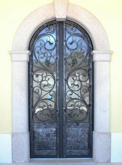 Hammered wrought iron entrance door
