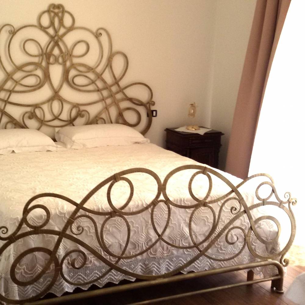 Wrought iron bed with modern design