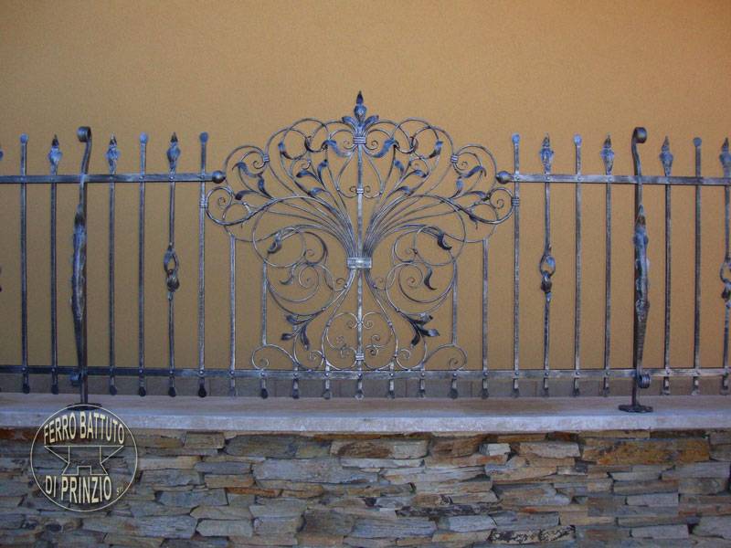 Wrought iron fence with volute