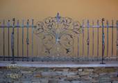 Wrought iron fence with volute