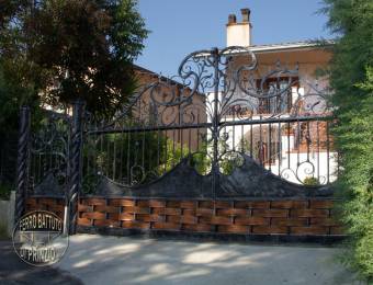 Wrought iron gate with copper