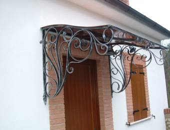 decorated wrought iron and copper canopy