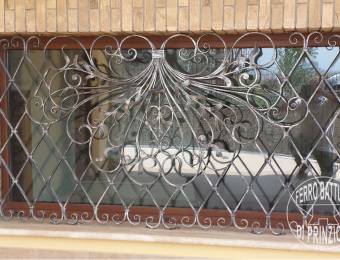 Wrought iron fixed grille