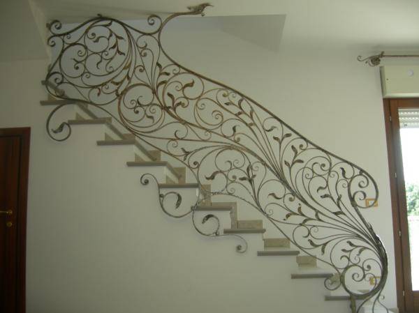 Wrought iron railing for interior stairway