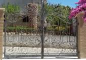 Decorated gates in wrought iron made in italy