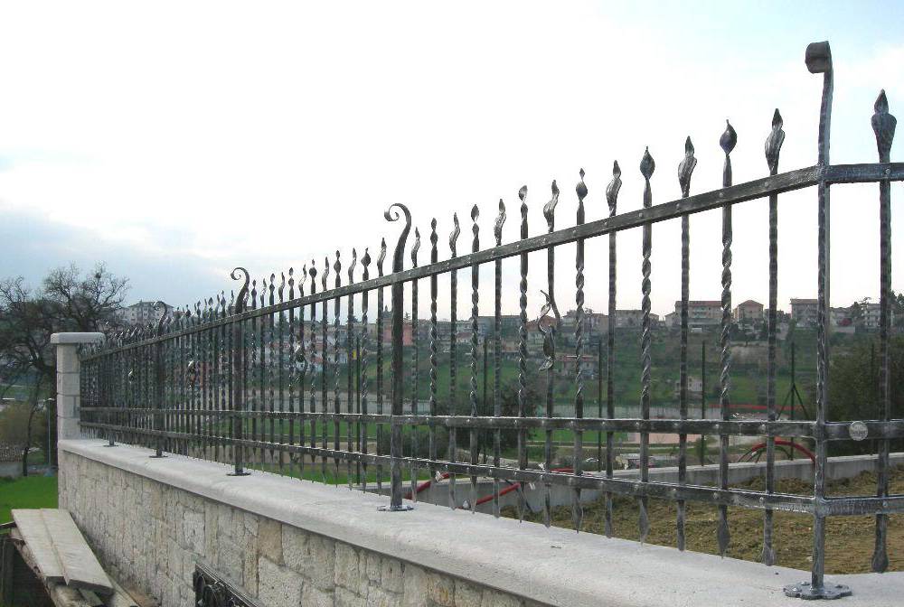 Hammered iron fence