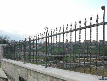 Hammered iron fence