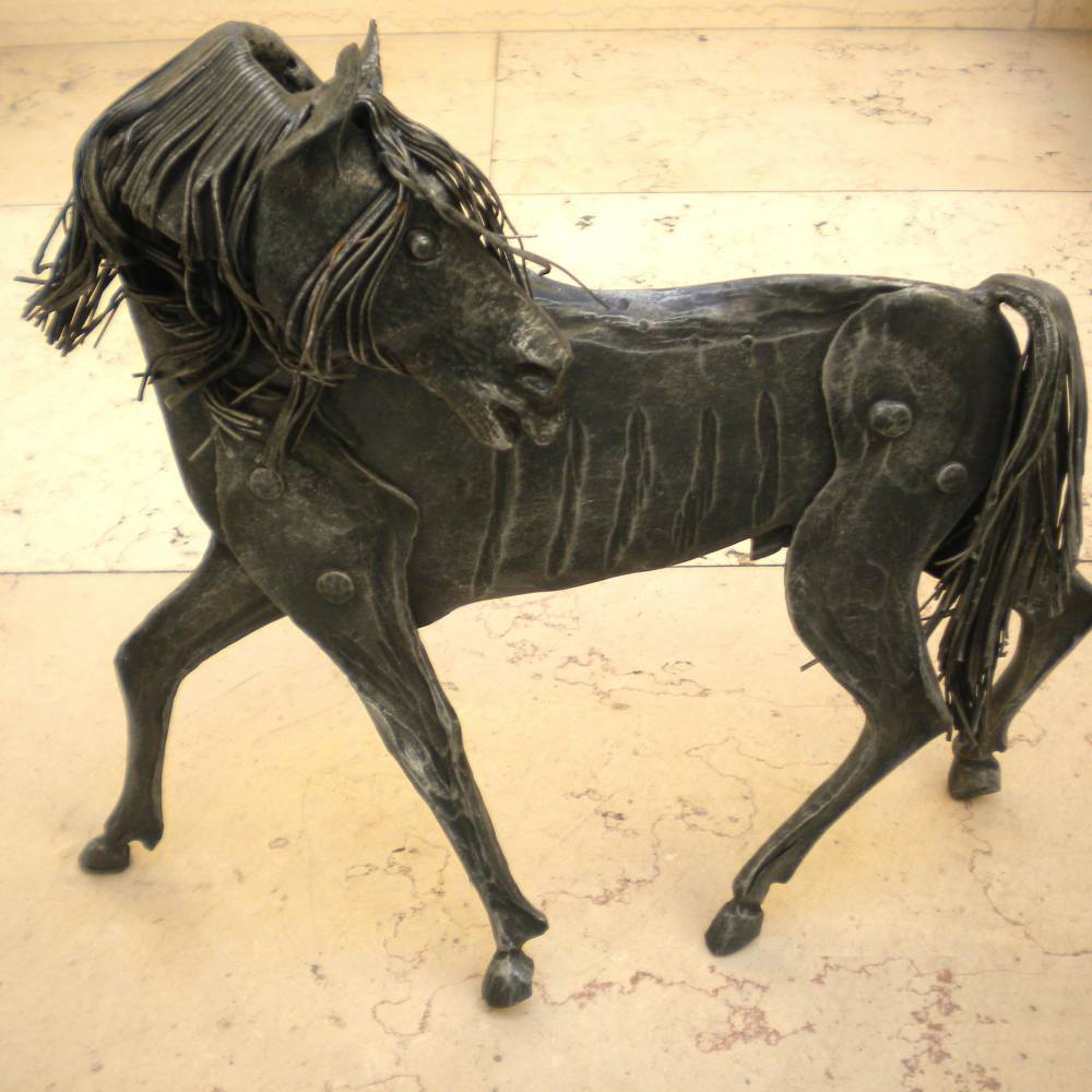 hammered wrought iron, hand made, representing a horse