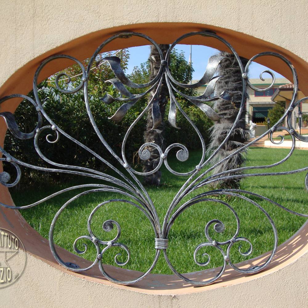 Wrought iron grate