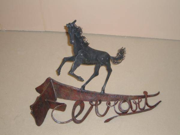 Sculpture in wrought iron representing Ferrari Stallion and logo