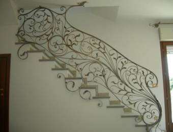Wrought iron railing for interior stairway