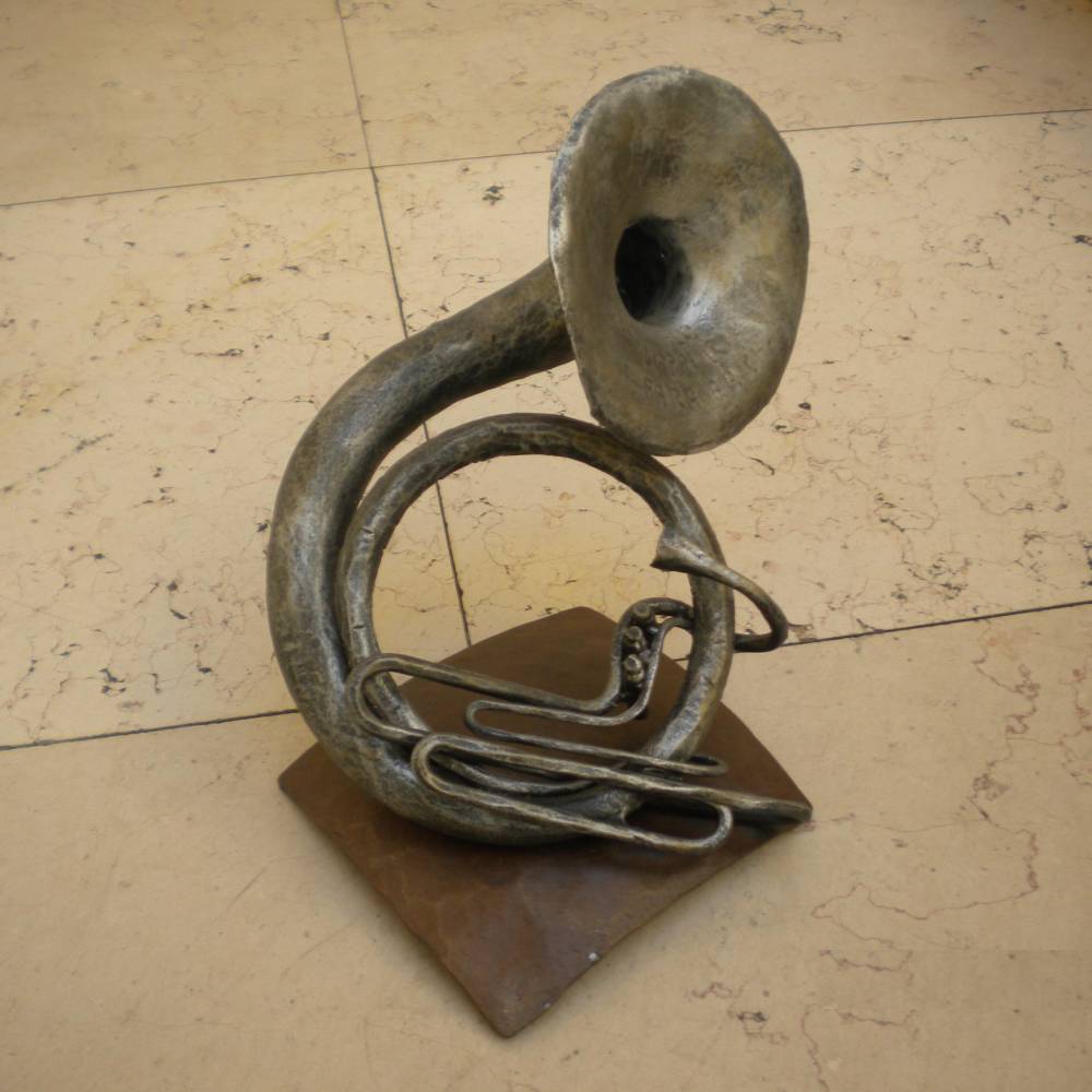 wrought iron sculpture representing a trumpet