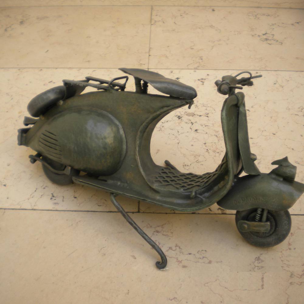 wrought iron sculpture representing a vespa