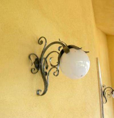 Lantern in wrought iron floral work