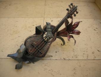 hand made wrought iron sculpture representing a guitar
